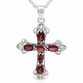 Silver oval garnet oxized frilly boho cross