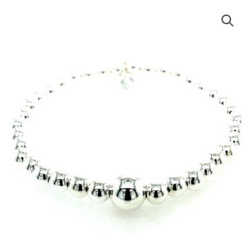 SILVER HOLLOW BALL ON ELASTIC BRACELET