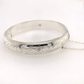 SILVER HOLLOW ENGRAVED D-SHAPE HINGE BANGLE