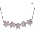 SILVER CZ PAVE DAISIES ON ANCHOR CHAIN