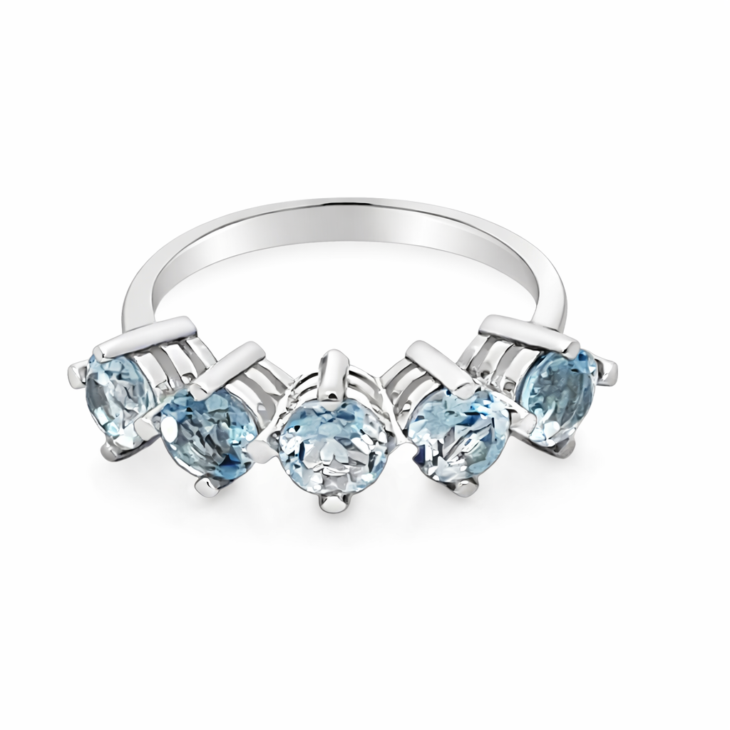 Blue Topaz Silver Claw Set Ring