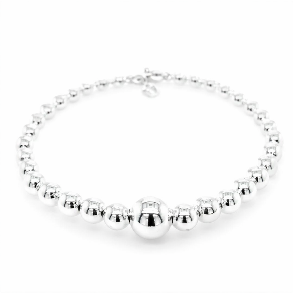 Silver hollow ball on elastic bracelet