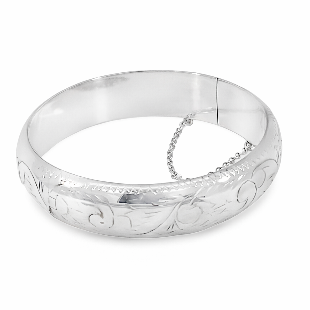 Silver hollow engraved d-shape hinge bangle