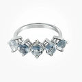 Blue Topaz Silver Claw Set Ring