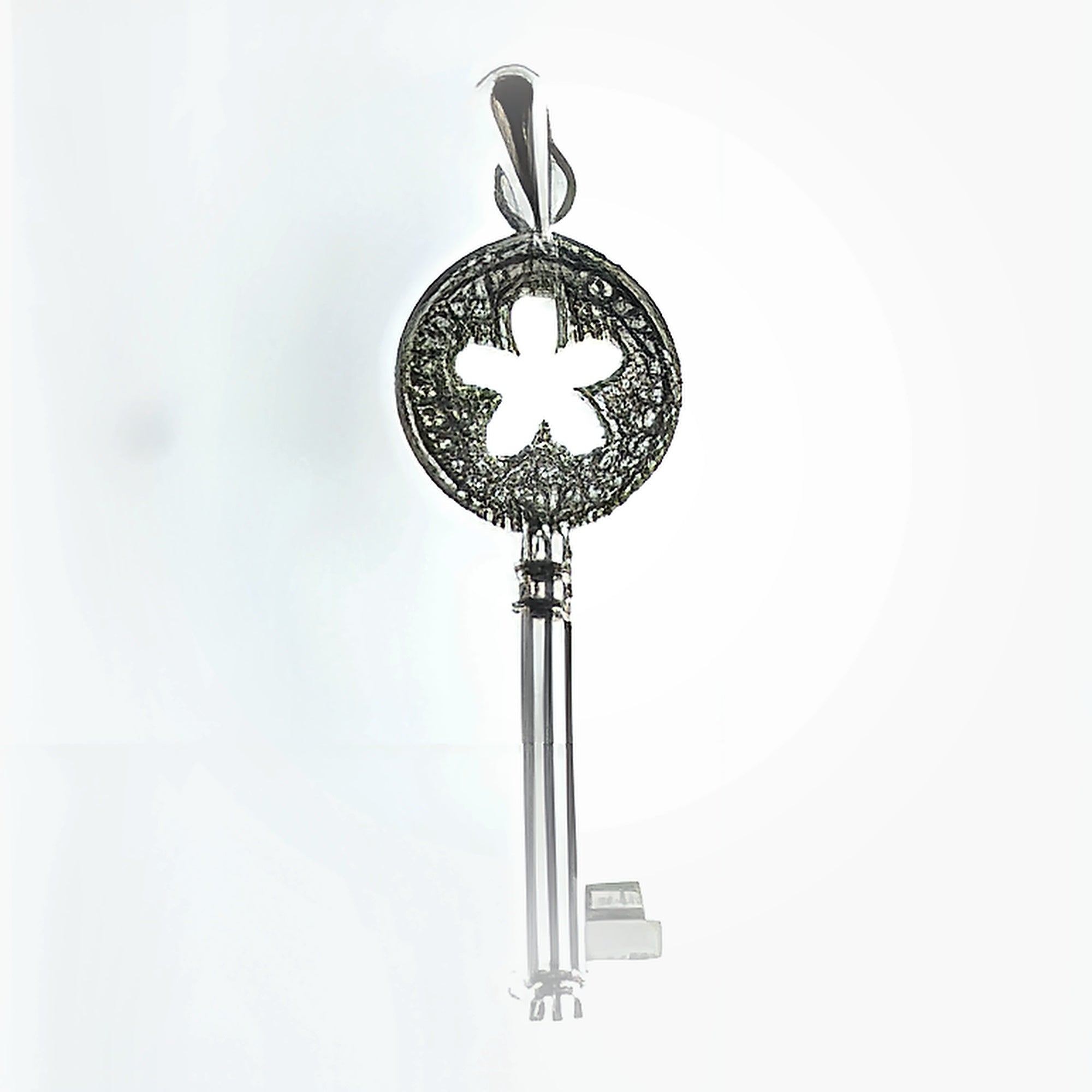 SILVER CUT OUT FLOWER MILLGRAIN KEY PENDANT